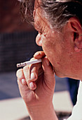 Man smoking cigarette