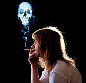 Composite of woman smoking,skull formed by smoke