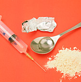 Syringe,spoon and drug used by a heroin addict