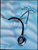 Stethoscope hanging out of pocket on white coat