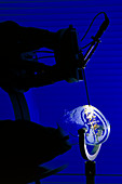 Robot carrying out simulated brain surgery