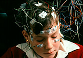 Boy undergoing EEG examination