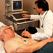 Heart ultrasound scan being conducted on a man