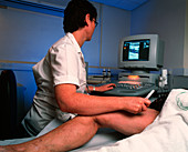Doppler ultrasound examination of a leg