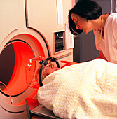 Patient undergoing a brain PET scan