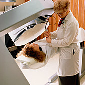 Woman receiving gamma camera scan