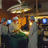 Laparoscope examination by surgeons in theatre