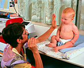 Baby boy receiving squint test