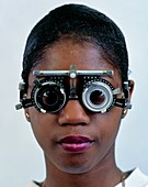 Ophthalmology test frames on a teenage girl
