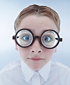 Child wearing spectacles