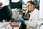 Pathologist in his lab