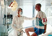 Bone marrow transplant patient in sterile room