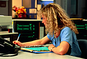 Hospital work station: nurse with cardiac monitors