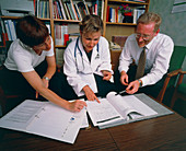 Hospital conference: staff discuss hospital issues