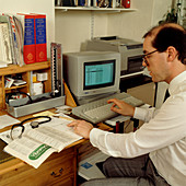 GP using computerised patient records system