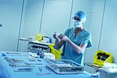 Nurse with sterilised instruments