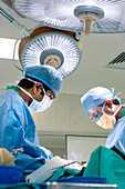 Surgeons operating