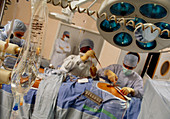 Surgeons perform quadruple bypass heart operation