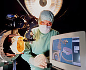Neurosurgeon with robot for brain surgery