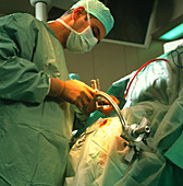 Neurosurgeon performing brain biopsy