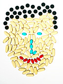 Happy face made from pills