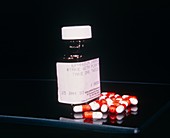 A bottle containing anticonvulsant drug pills
