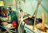 Mother and child receive hyperbaric oxygen therapy