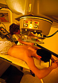 Patient being treated with radiotherapy