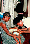 Nurse giving injection,Kingston Jamaica