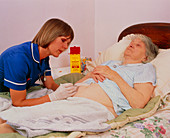 District nurse: abdominal injection of old woman