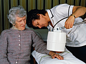 Physiotherapist giving pain relief