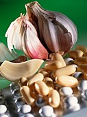 Garlic cloves and pills containing garlic oil