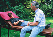 Hypnotherapist with young male subject