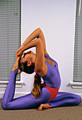 Woman performing a yoga exercise