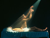 Transfiguration: figure leaving body