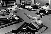 View of elderly people during a yoga class