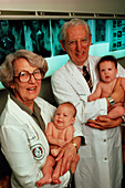 Howard & Georgeanna Jones holding two IVF babies