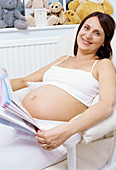 Pregnant woman reading