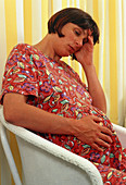 Pregnant woman suffering depression or illness