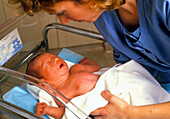 Nurse with a newborn baby