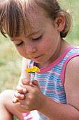 Young girl with a flower