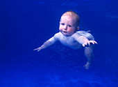 Baby swimming underwater