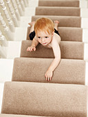 Boy climbing stairs