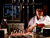 Technician researching kidney dialysis membranes