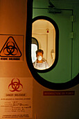 Dr Quentin Sattentau in air lock of an AIDS lab