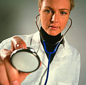 Patient's eye view of a GP doctor with stethoscope