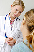 Doctor talking with her patient