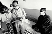 Doctors in tuberculosis ward in the third world