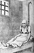 18th century female patient chained to a post