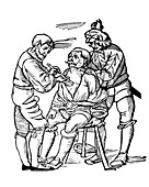 Woodcut of a wounded man being treated